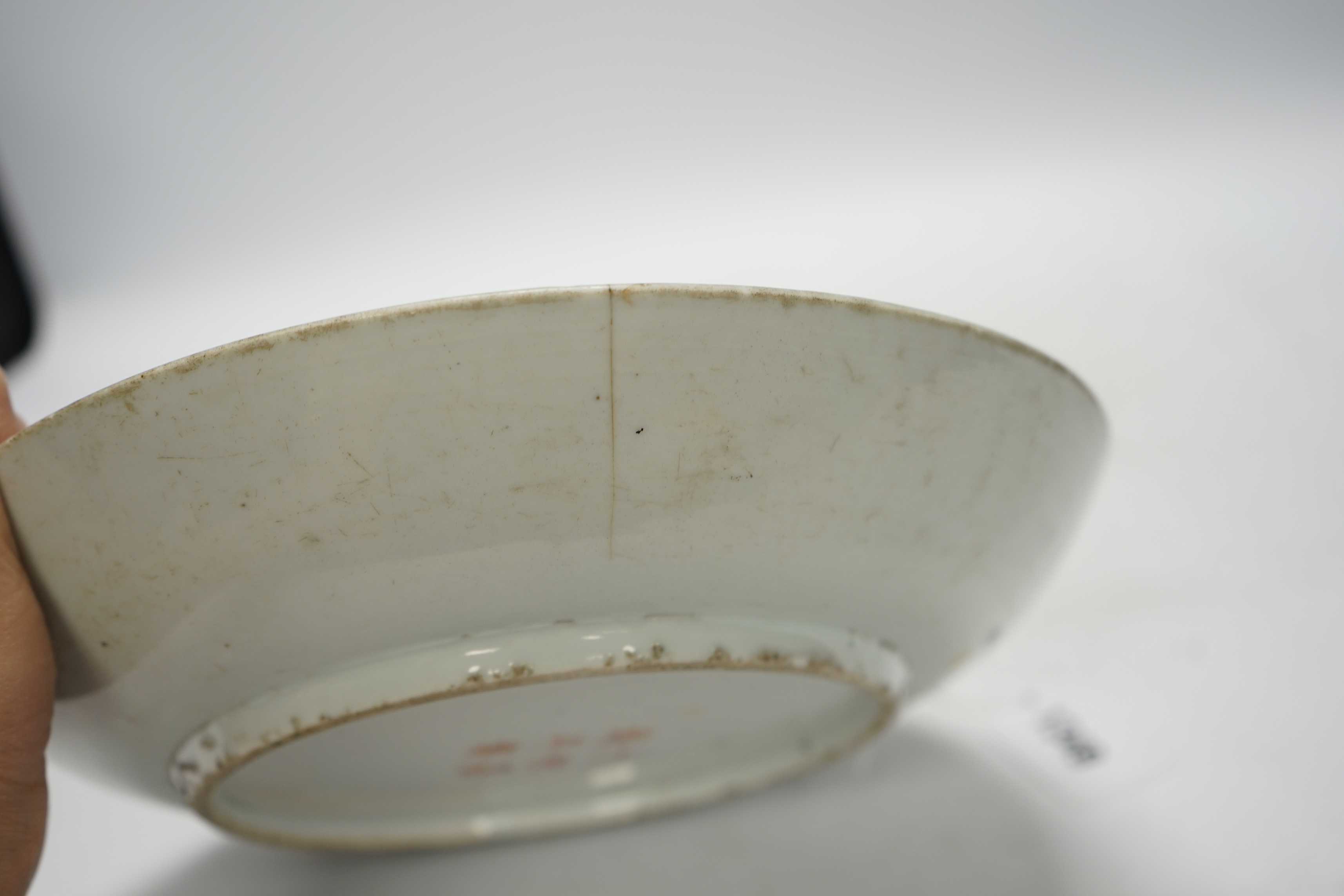 A Chinese famille verte dish, Jiajing mark, 19th century, 27cm in diameter. Condition - poor